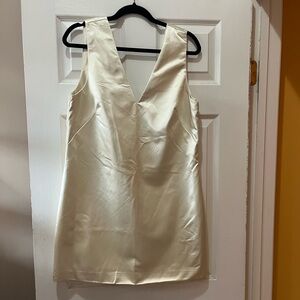 Cream Sleeveless bow back Dress